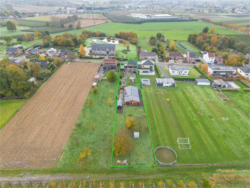 RUIME GEZINSWONING BOORDEVOL POTENTIEEL IN NIEUWERKERKEN foto 3
