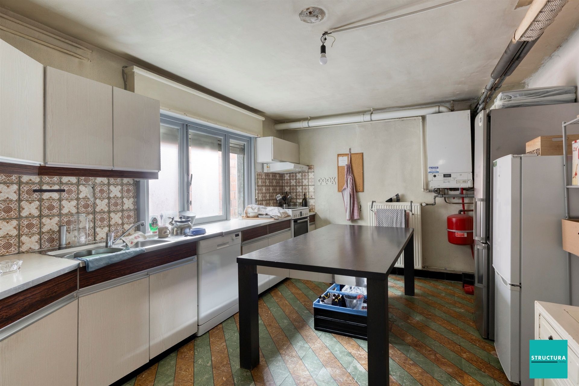 Ruime woning met potentieel in hartje Merchtem
 foto 6