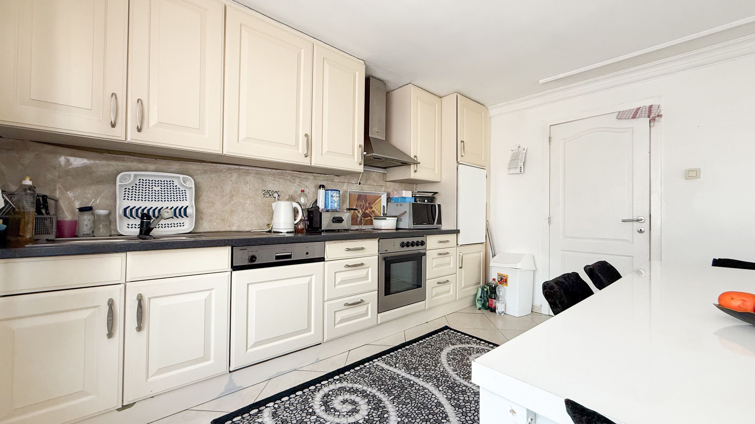 Lichtrijk appartement met 3 slpks, tuin én staanplaats! foto 7