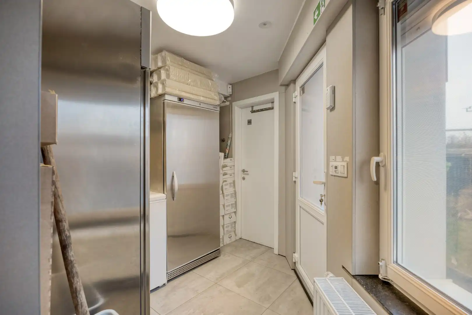 Opbrengsteigendom met handelspand en 3 appartementen te koop in Heverlee op een super ligging! foto 11