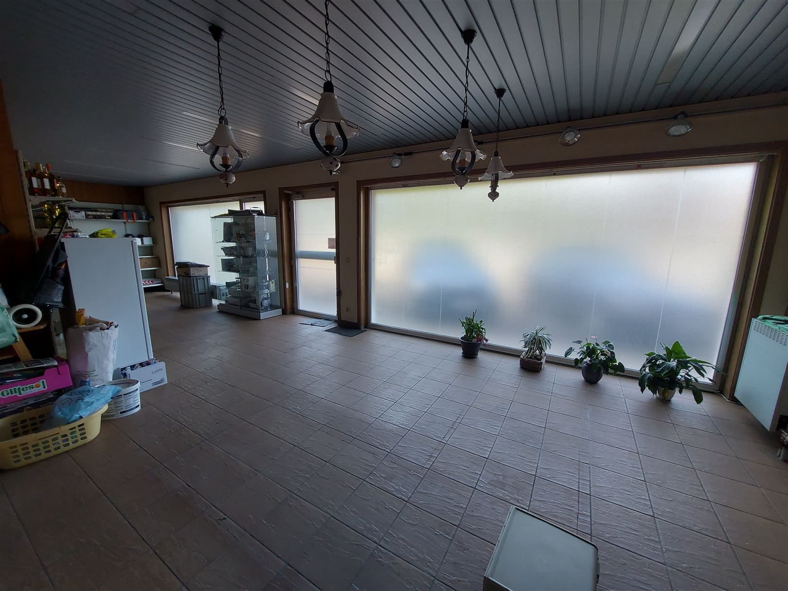 Veelzijdig renovatiepand met woonst en winkel Vloesberg foto 17