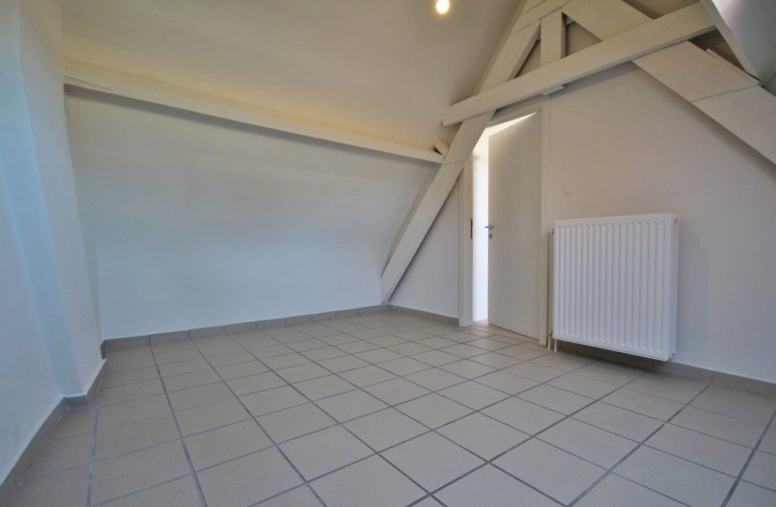 Lichtrijk en ruim duplex appartement foto 7