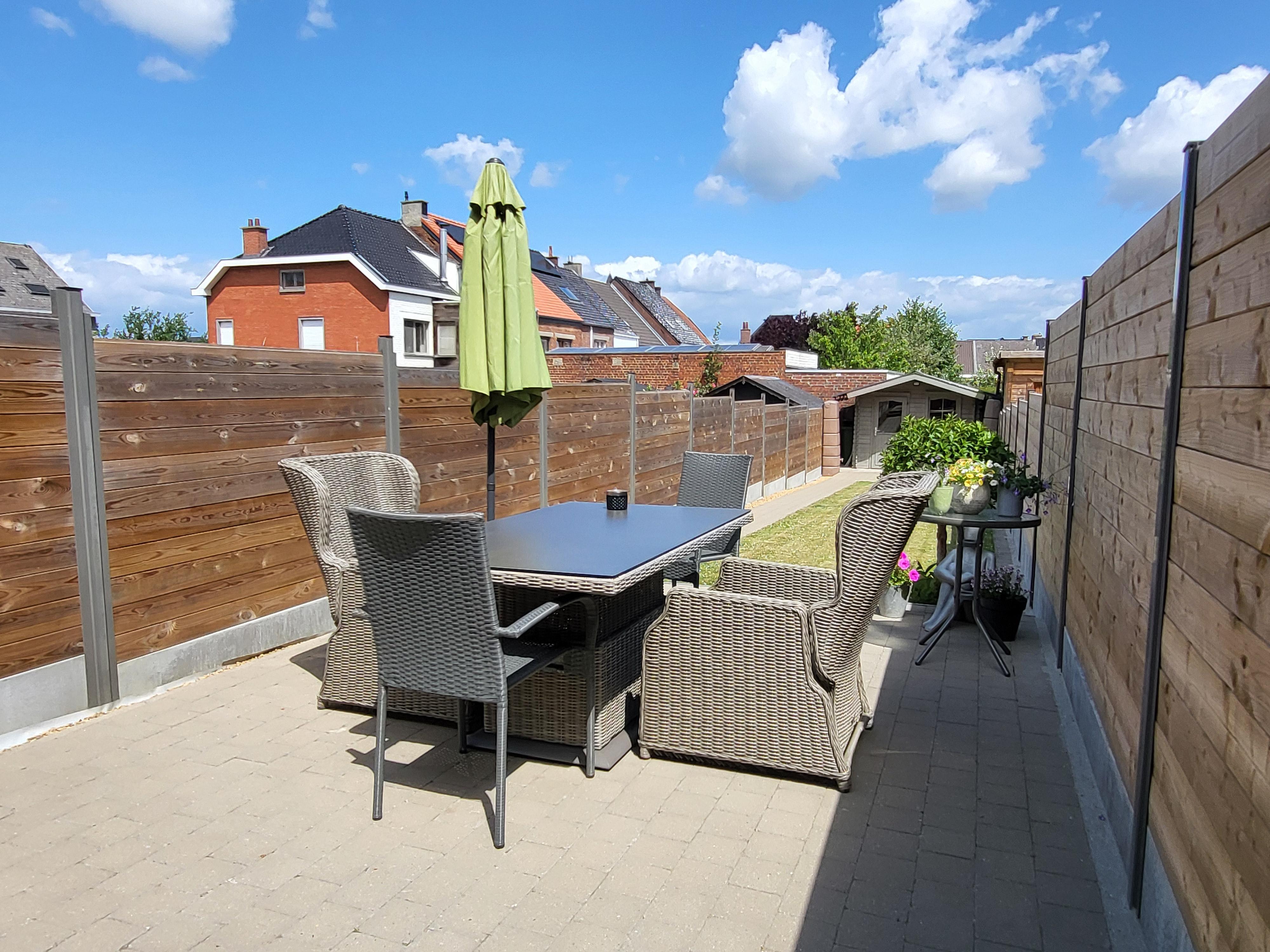 Prachtig onderhouden woning met zonnig tuintje en terras. foto 7