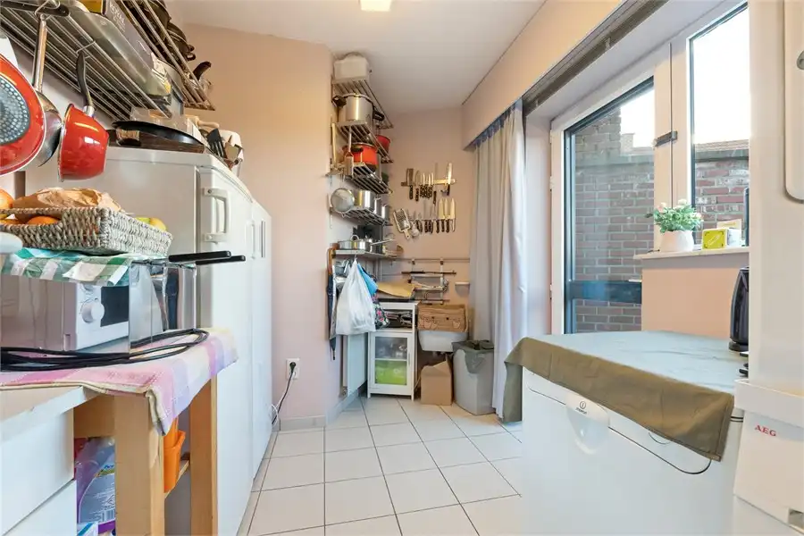 OPBRENGSTEIGENDOM MET HANDELSRUIMTE EN DUPLEX-APPARTEMENT IN SINT-TRUIDEN foto 21