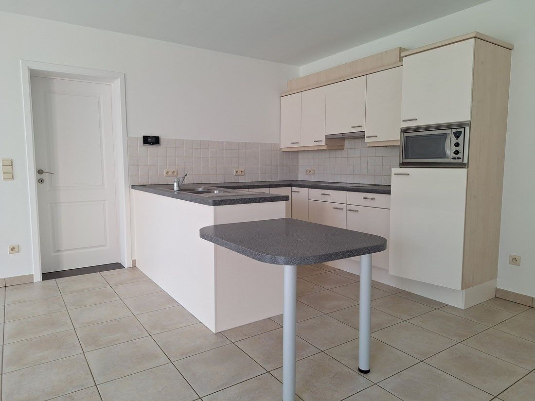 Knap opgefrist gelijkvloers appartement te Paal foto 7