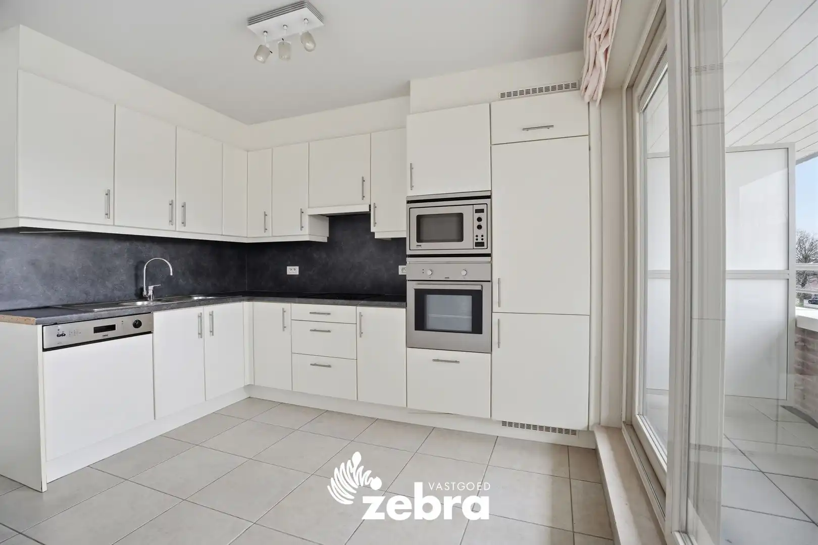 Duplex-appartement met 3 slpk, 3 terrassen + 2 badk in Roeselare! foto 5