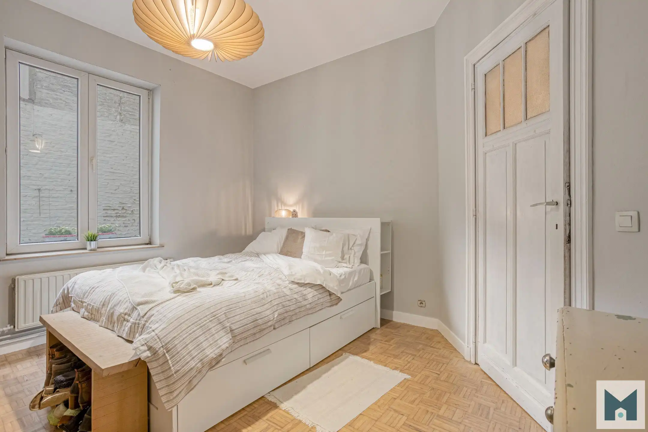 Ruim gelijkvloers appartement met 2 slpks en stadskoer! foto 12