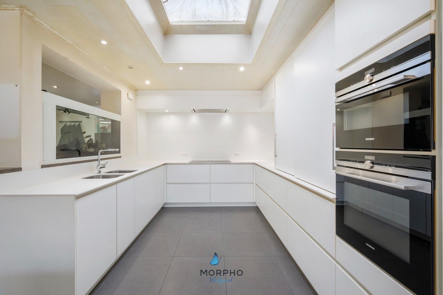 Ruime en energiezuinige woning met wellness, 4 slpks en praktische stadstuin in hartje Veldegem foto 9