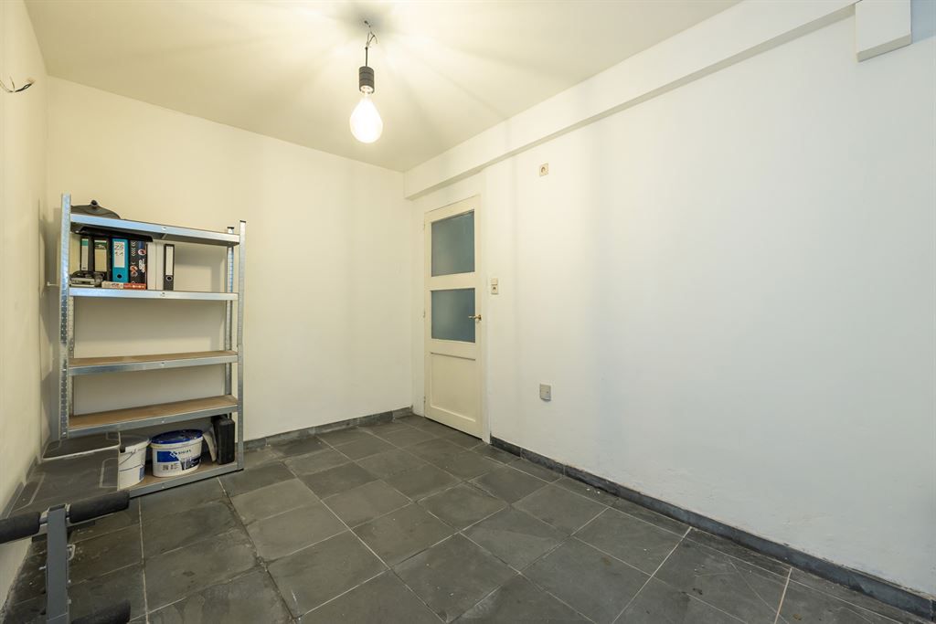 Karaktervol appartement met stadskoer foto 10