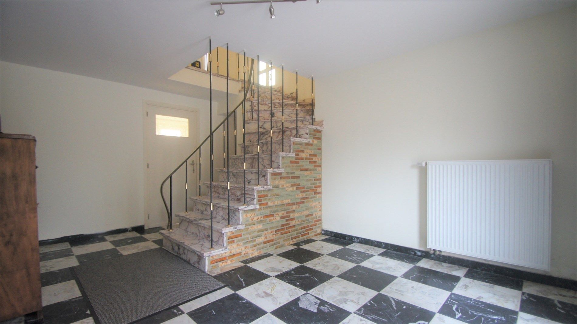 Mooi gelegen woning met tuin/terras, 2 slpks en garage foto 11