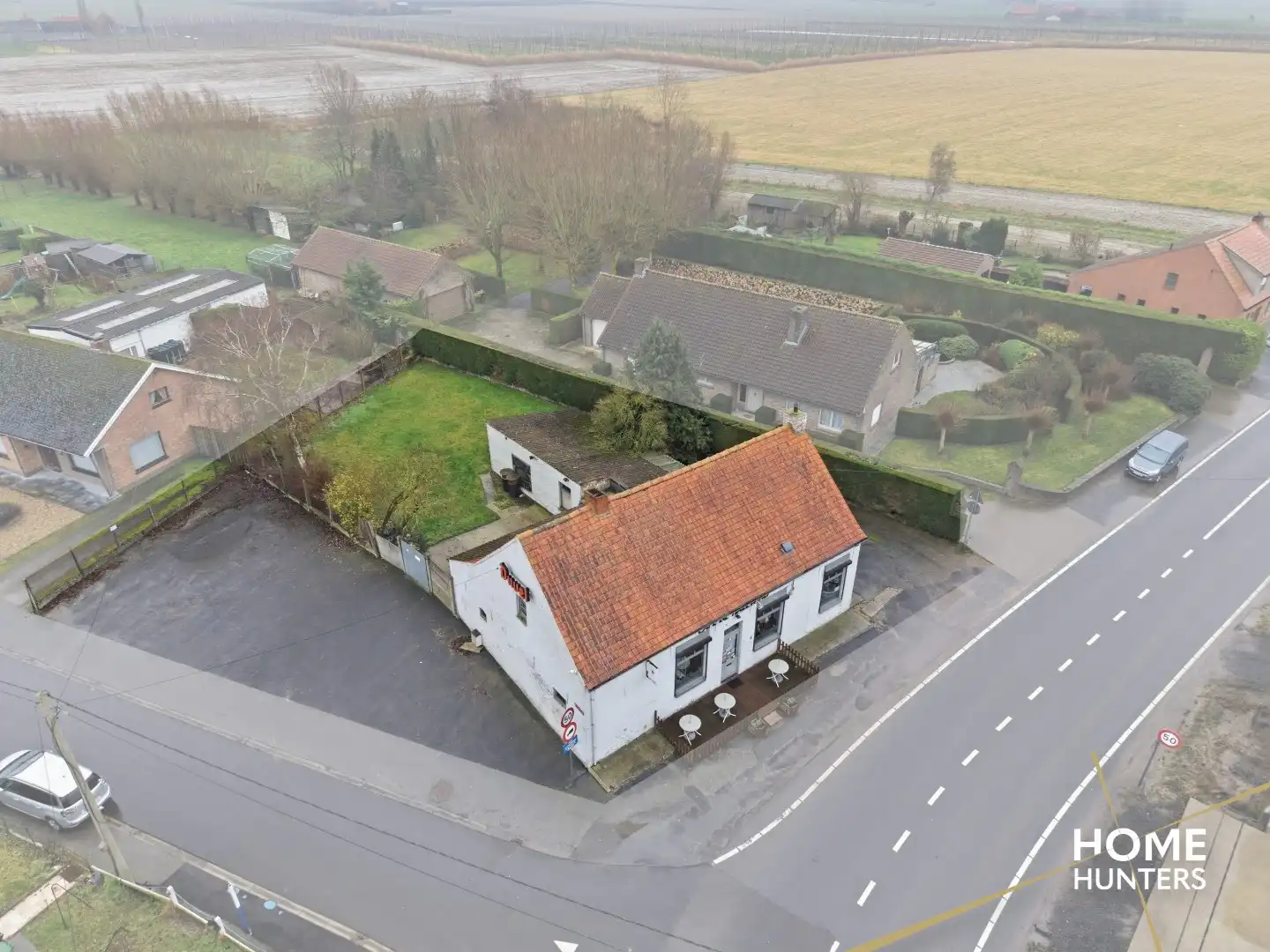 Te renoveren horecazaak met woonst op ruim perceel in Vlamertinge – Café De Hazewind foto 3
