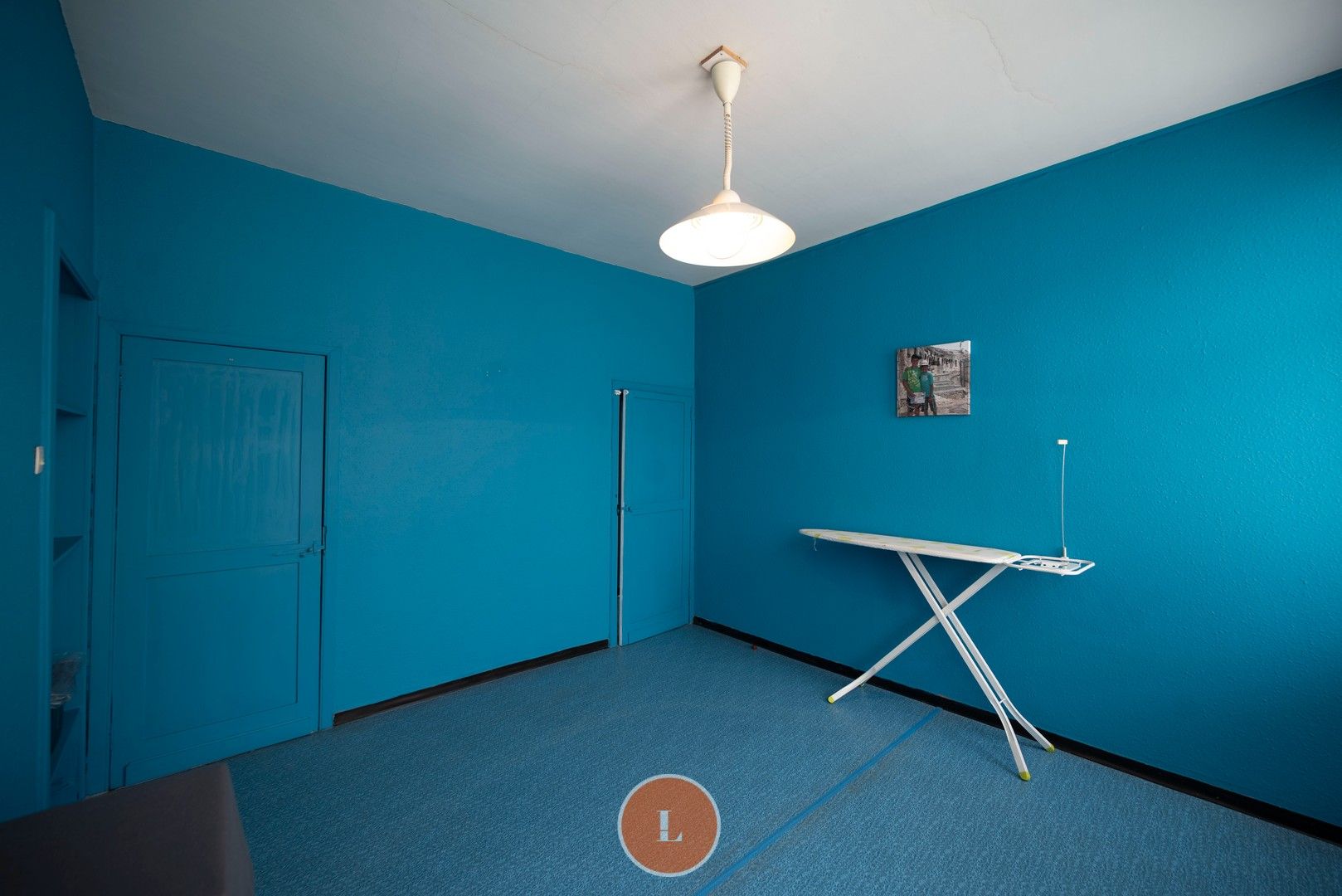 Te renoveren woning te koop in centrum Menen foto 12