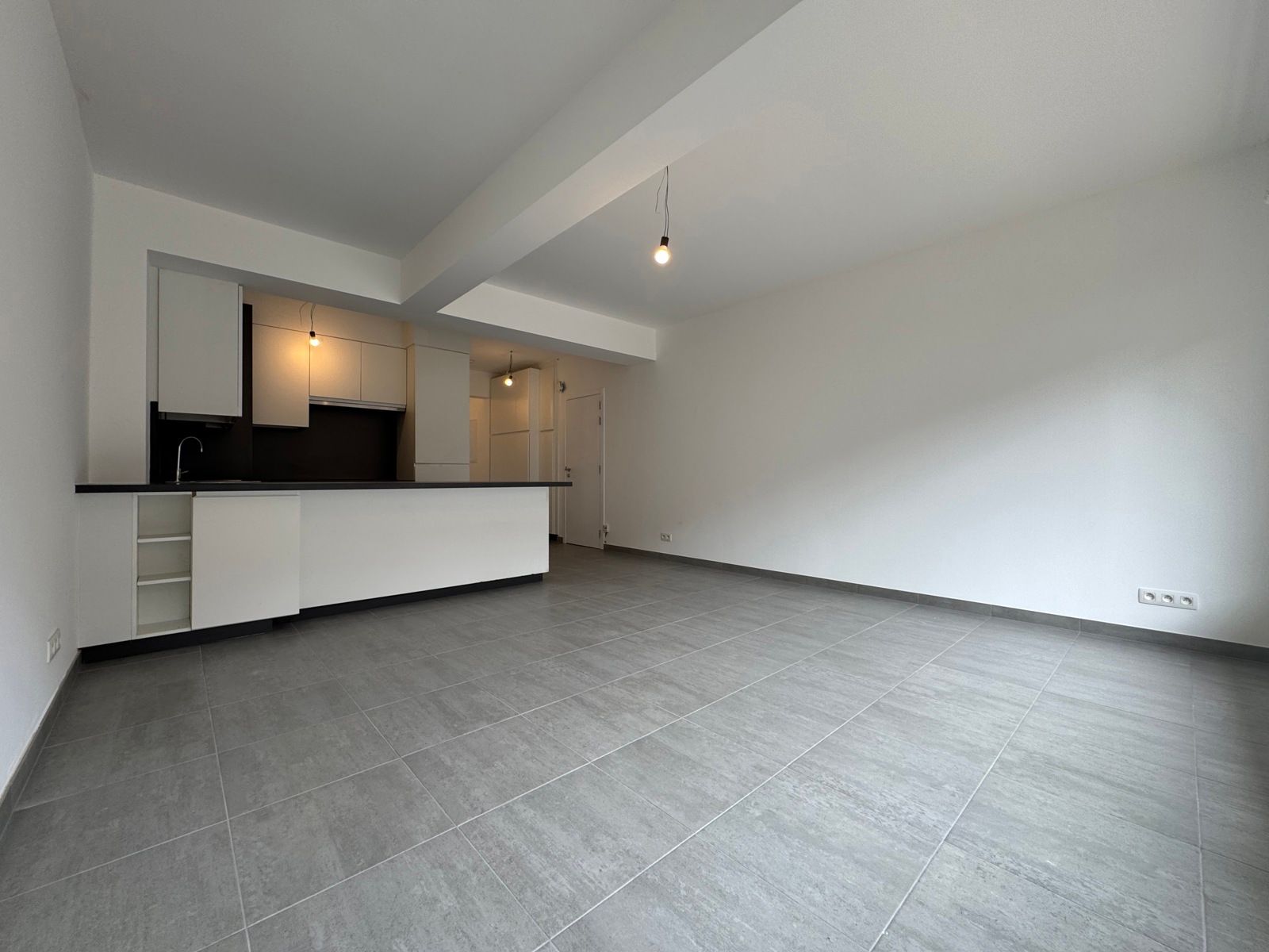 Te huur: gerenoveerd gelijkvloers appartement met tuintje foto 3