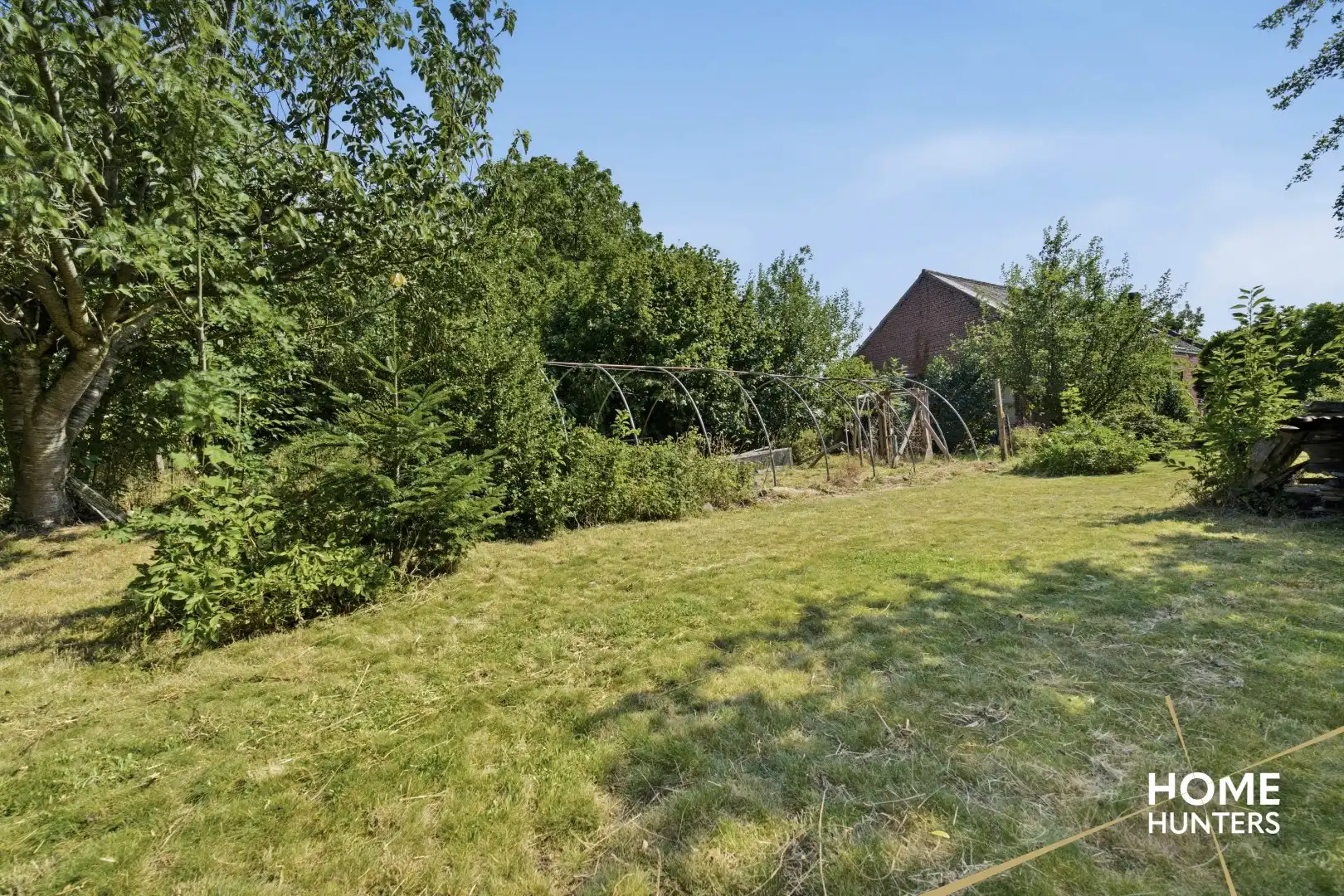 Veelzijdige eigendom met te renoveren woning en twee ruime loodsen in Langemark foto 27