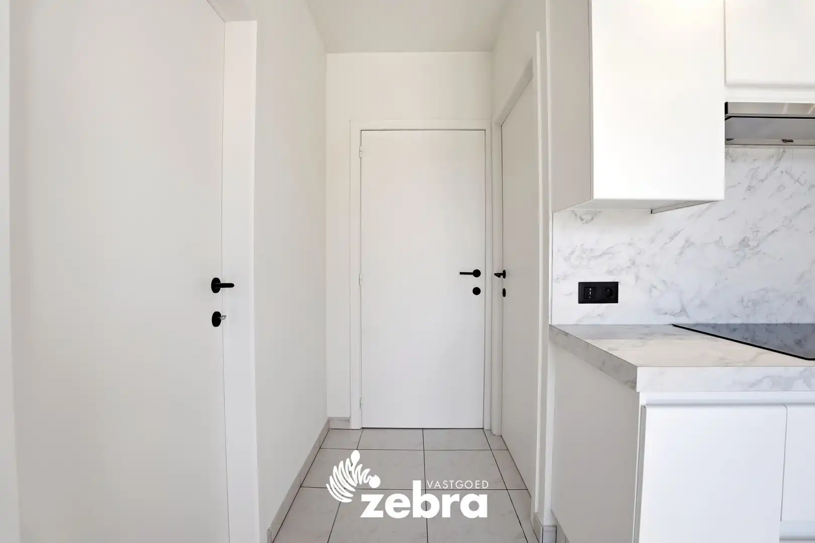 Zeer ruim appartement (137 m²) te koop met dubbele garage in het hartje van Tielt! foto 13
