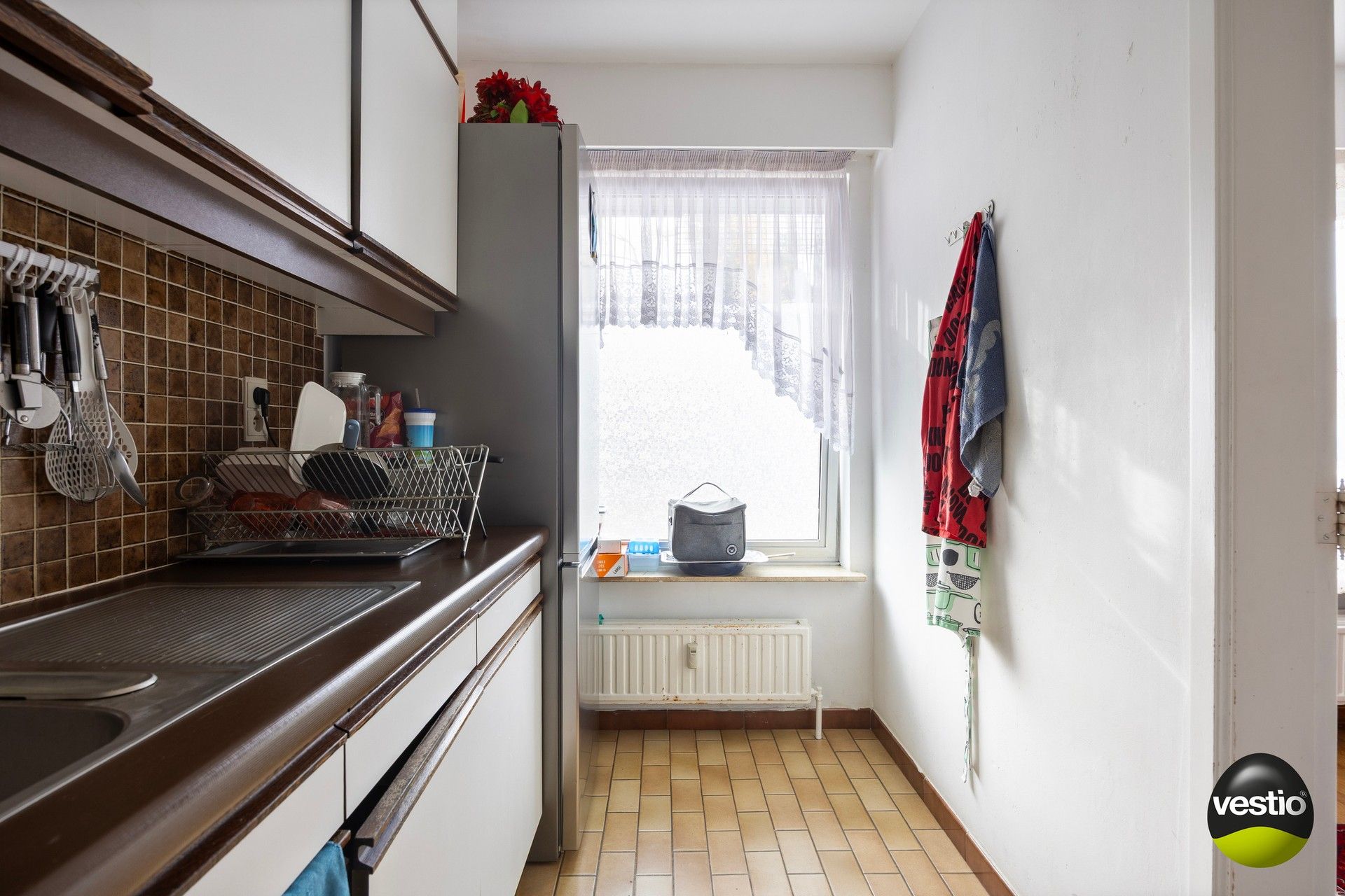 Te renoveren 3-slaapkamerappartement met garagebox en kelder. foto 5