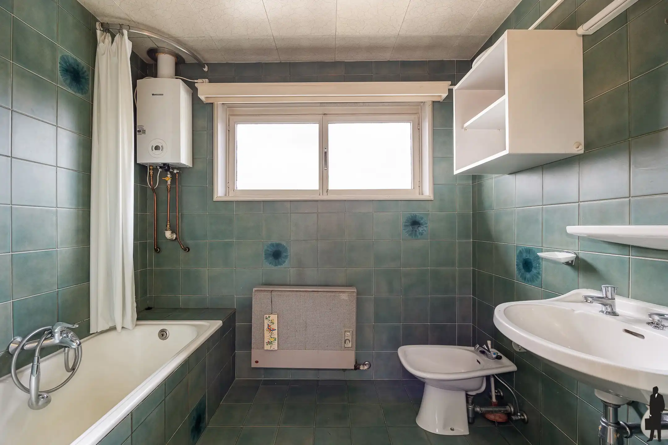 Te renoveren woning op toplocatie in het centrum van Beveren foto 11