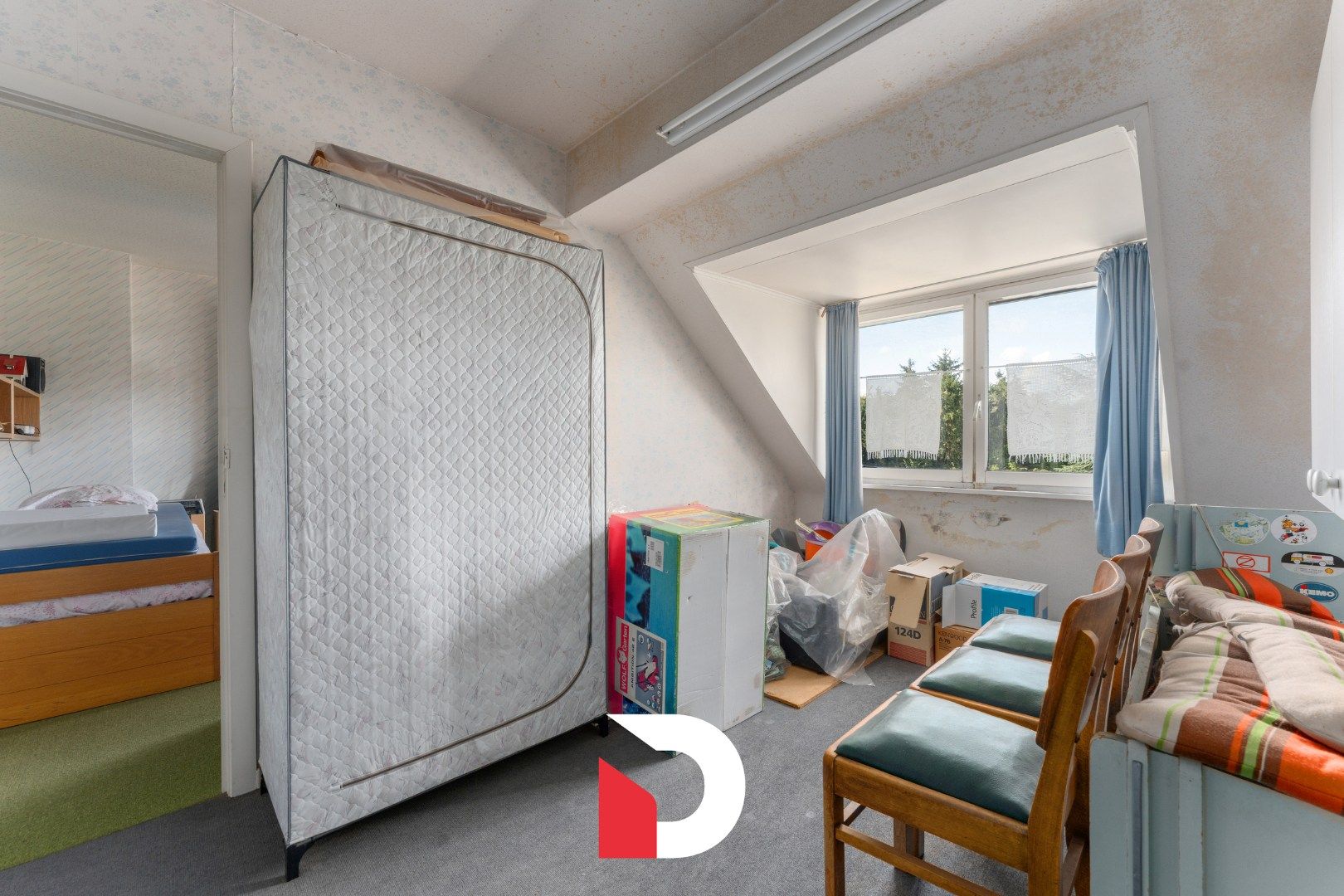 Te renoveren karakterwoning met diepe tuin en garage op centrale ligging foto 14