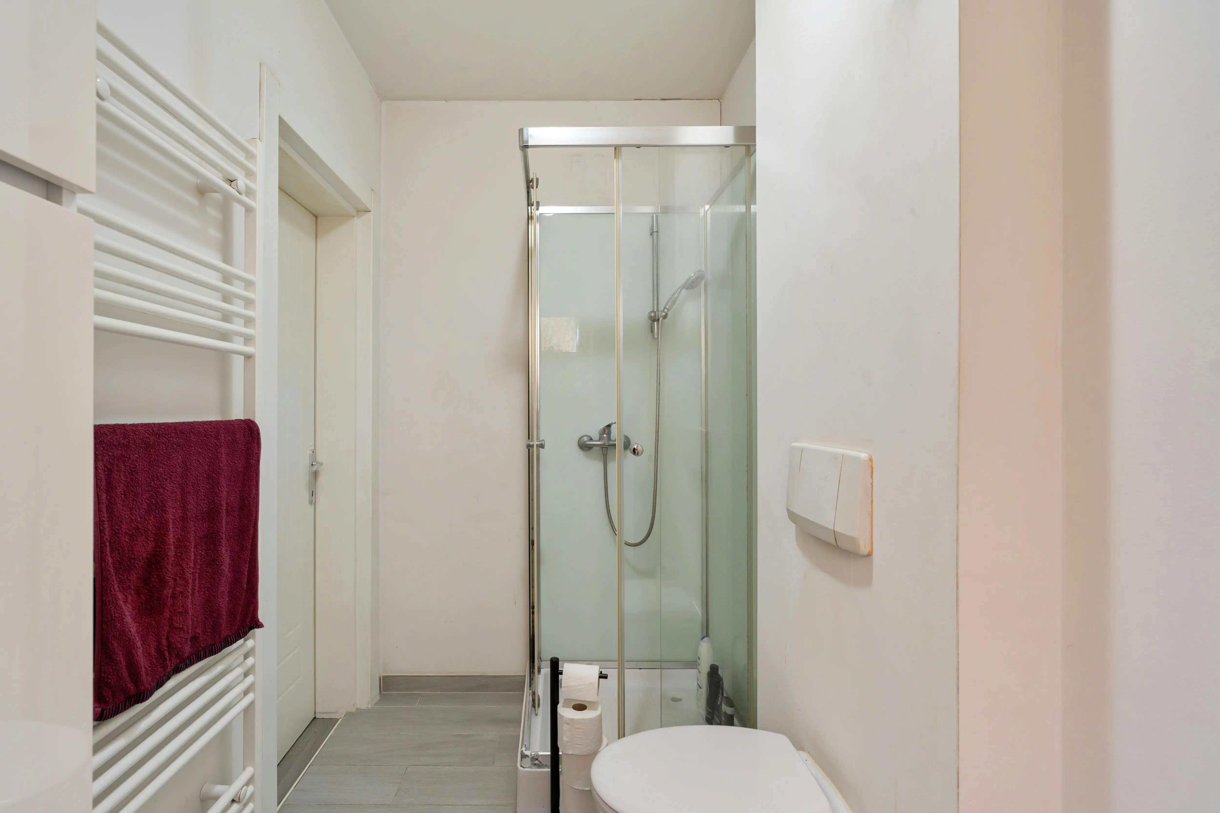 Rendabele opbrengsteigendom met handelspand, magazijn, woonst en 2 appartementen in Genk foto 18