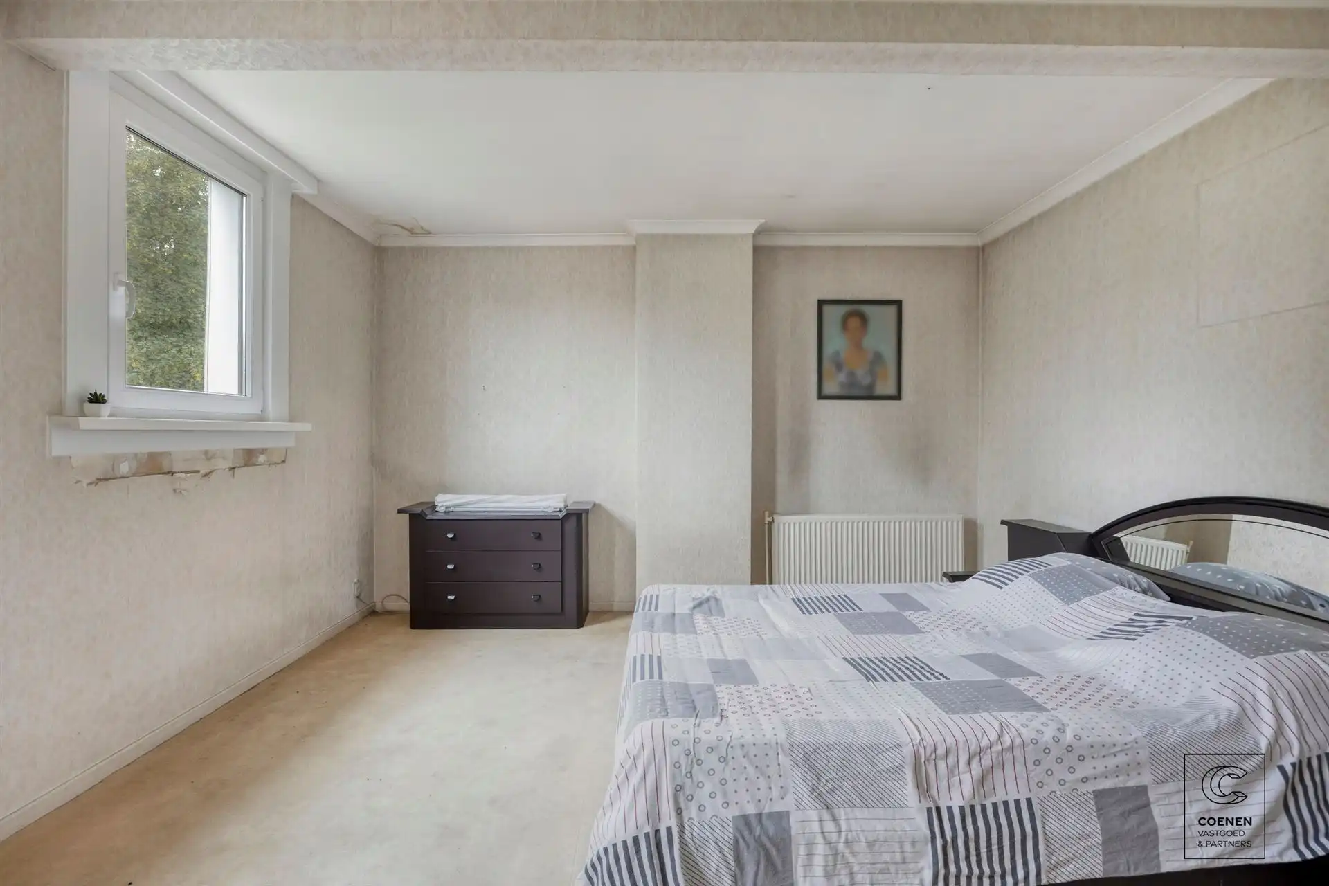 Te renoveren rijwoning van 187 m², twee slpk en ruime tuin! foto 11