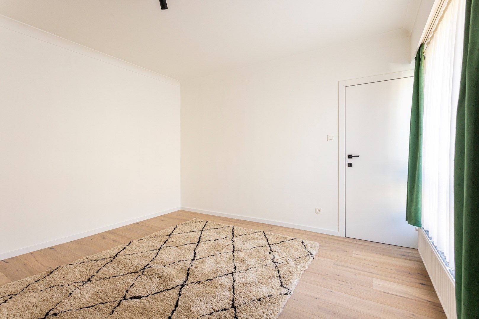 Charmant gelijkvloers appartement met 2 slaapkamers! foto 8