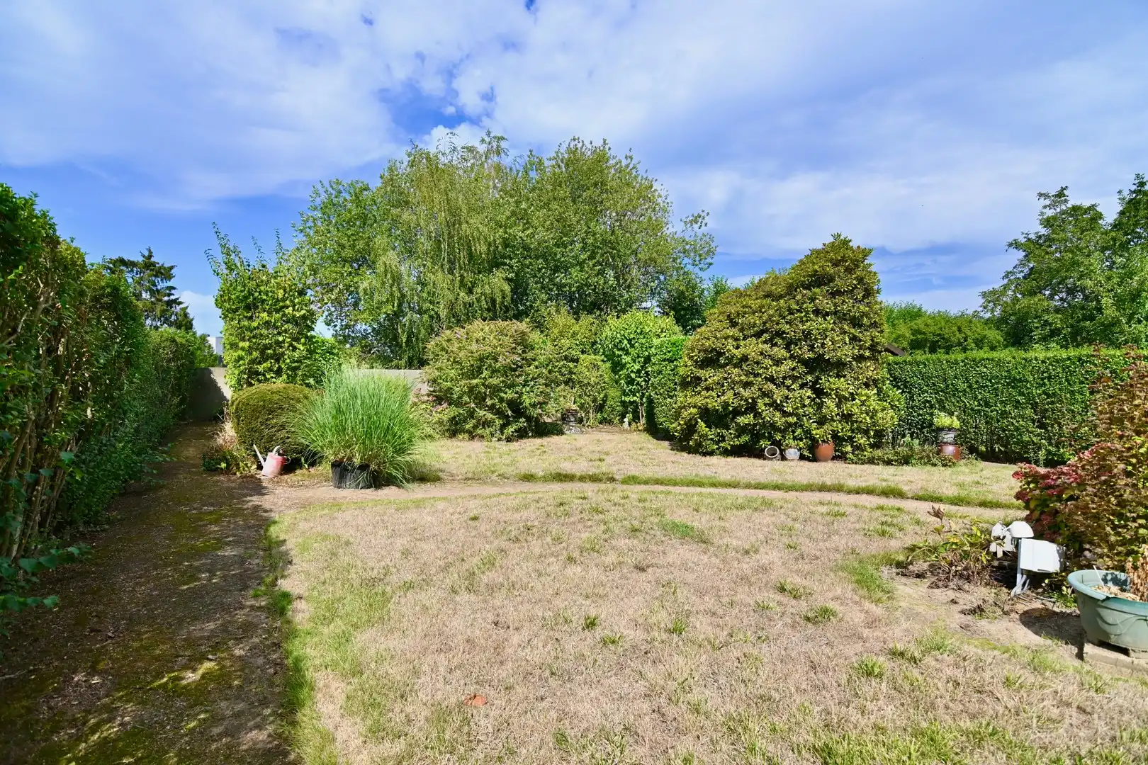 Ruime halfopen gezinswoning met prachtige westgerichte tuin foto 20
