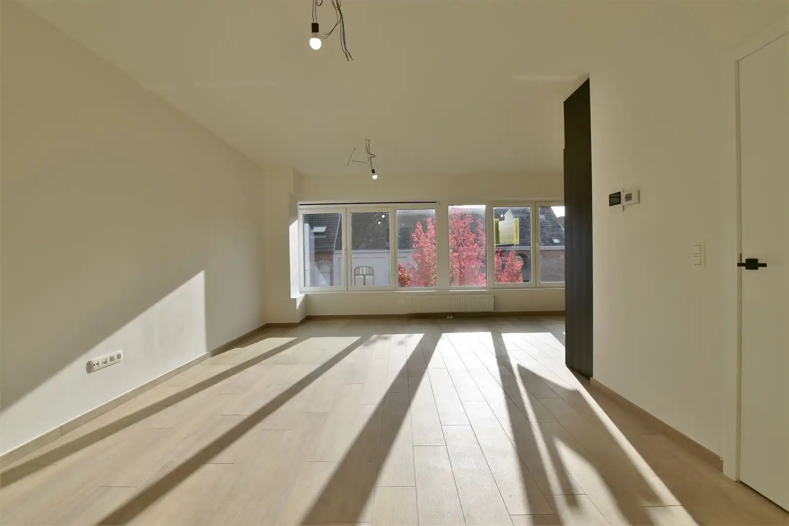 Prachtig dakappartement met terras, gelegen in het hartje van Sint-Gillis-Dendermonde. foto 9