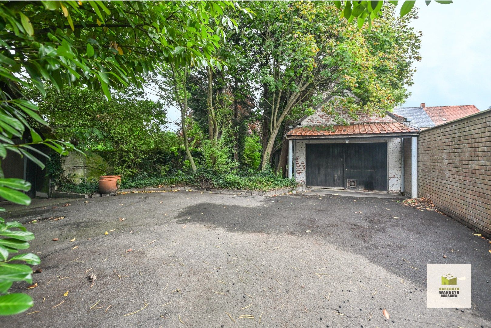 Karaktervolle, te renoveren woning met 3 slaapkamers, diepe tuin, garage met uitweg foto 21
