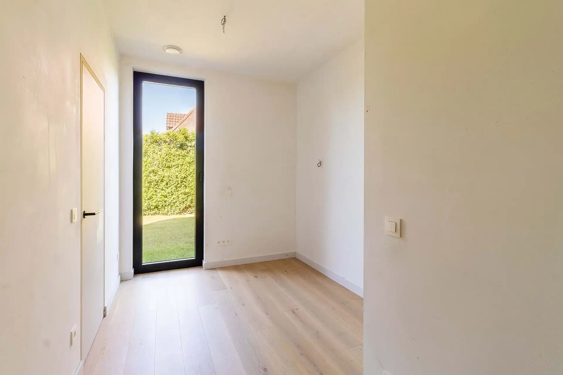 Hoogwaardig afgewerkt gelijkvloersappartement met tuin foto 12