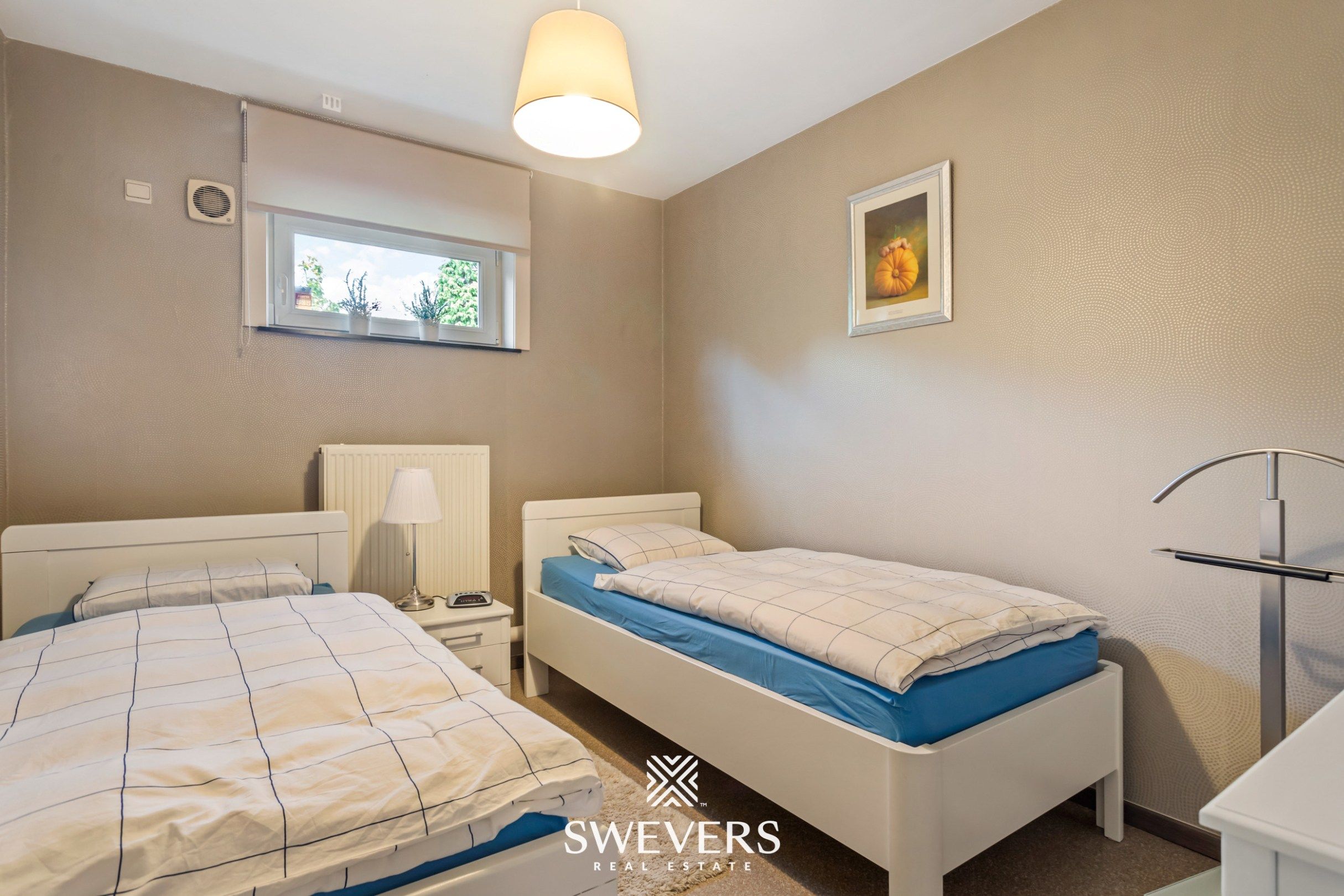 Ruime instapklare gezinswoning met 4 slaapkamers in rustige straat vlakbij Hasselt foto 15