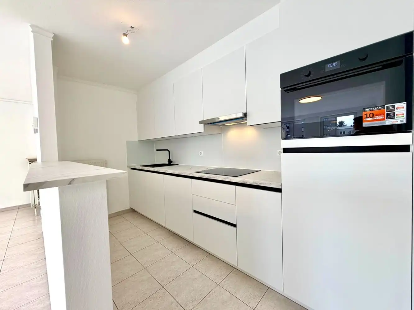 Gelijkvloers appartement met 2 slaapkamers en parking te huur in het centrum van Lanaken foto 7