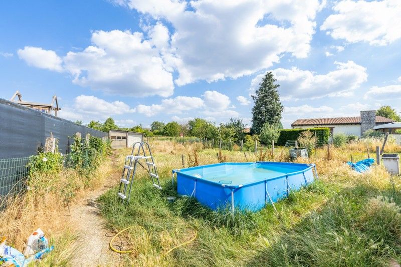 Te renoveren woning met tuin en garage op een perceel van 6are 39ca foto 20