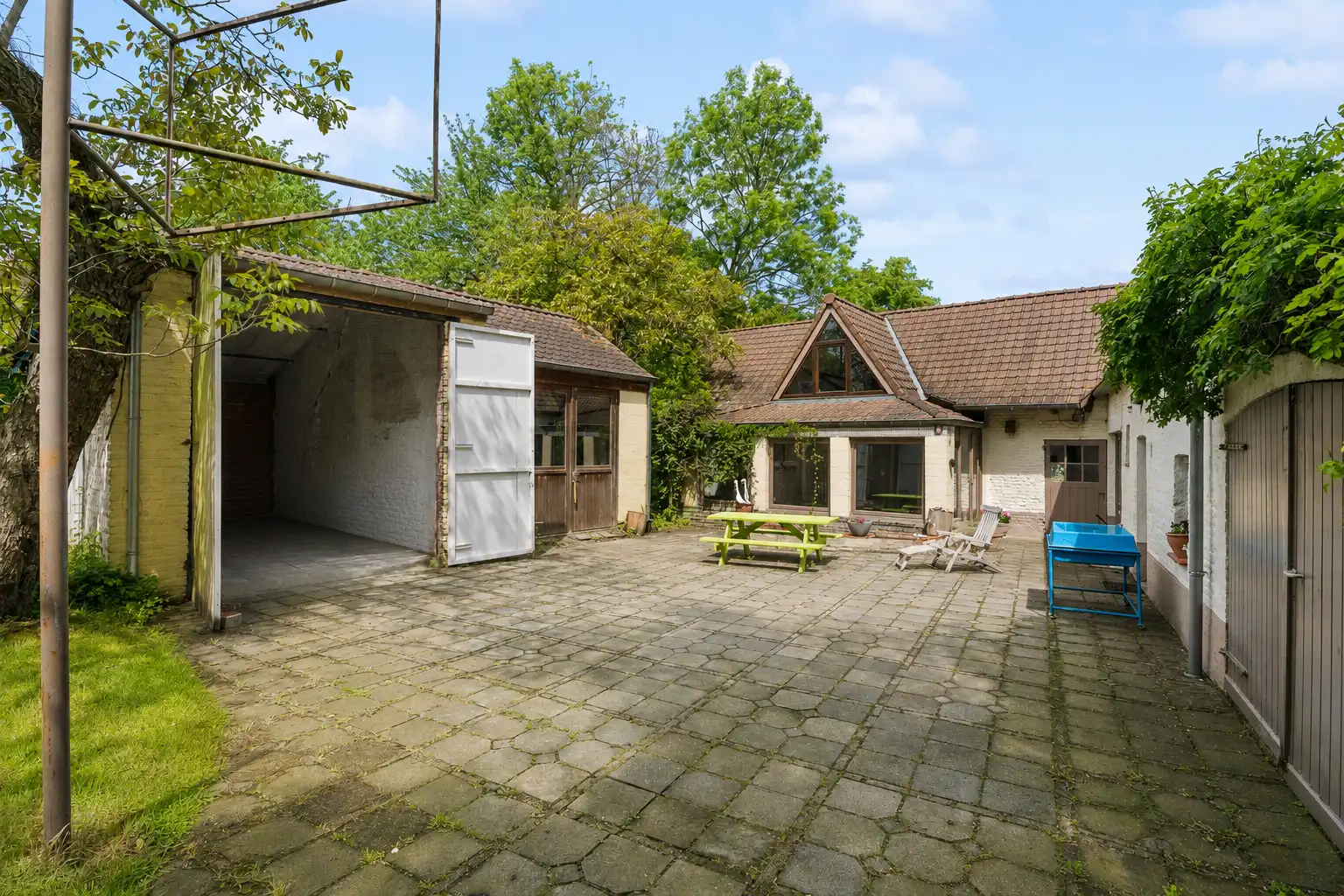 Charmant hoevetje met bijgebouwen in groen kader foto 14