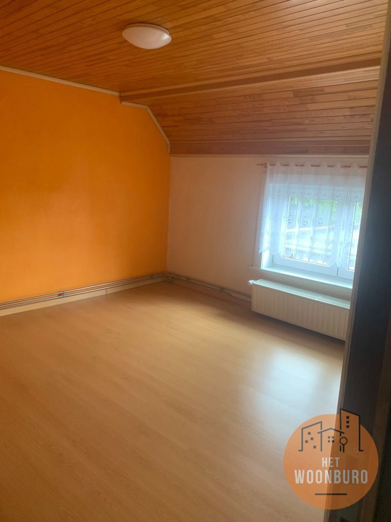 Rijwoning met garage en tuin foto 12