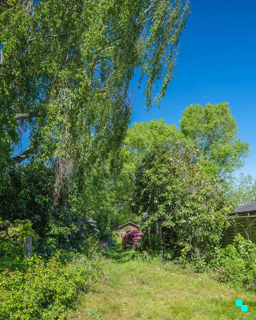 Te renoveren woning met gezellige tuin in het hart van Merelbeke foto 23