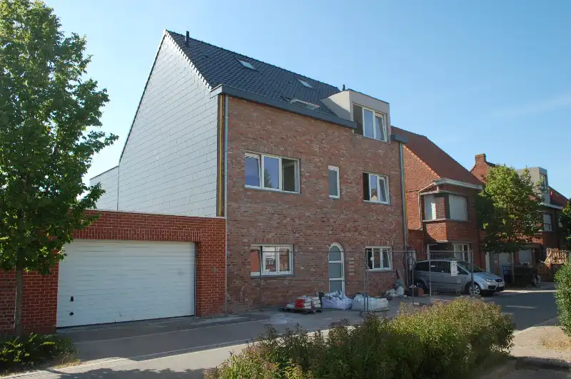 Nieuwbouwappartement in hartje Oedelem foto {{pictureIndex}}