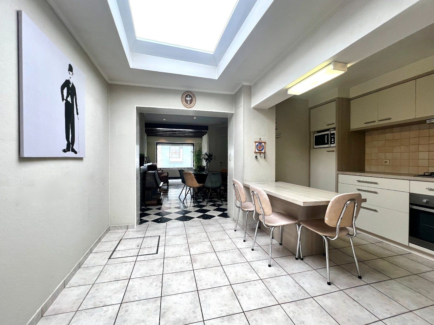 Charmante rijwoning te koop in hartje Harelbeke! – een ideale starterswoning of slimme investering! foto 12