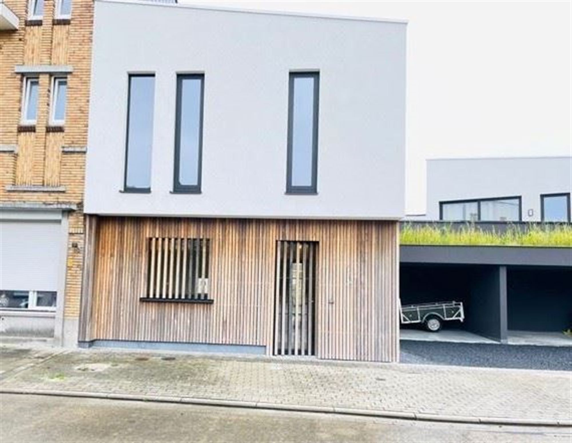 Rijwoning met 3 slaapkamers, terras en tuin foto 1