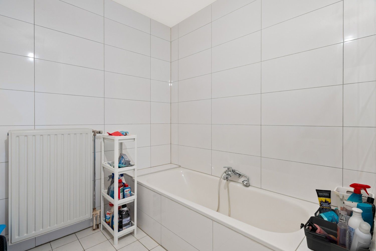 Ruim appartement met autostaanplaats in het centrum van Merksem! foto 11