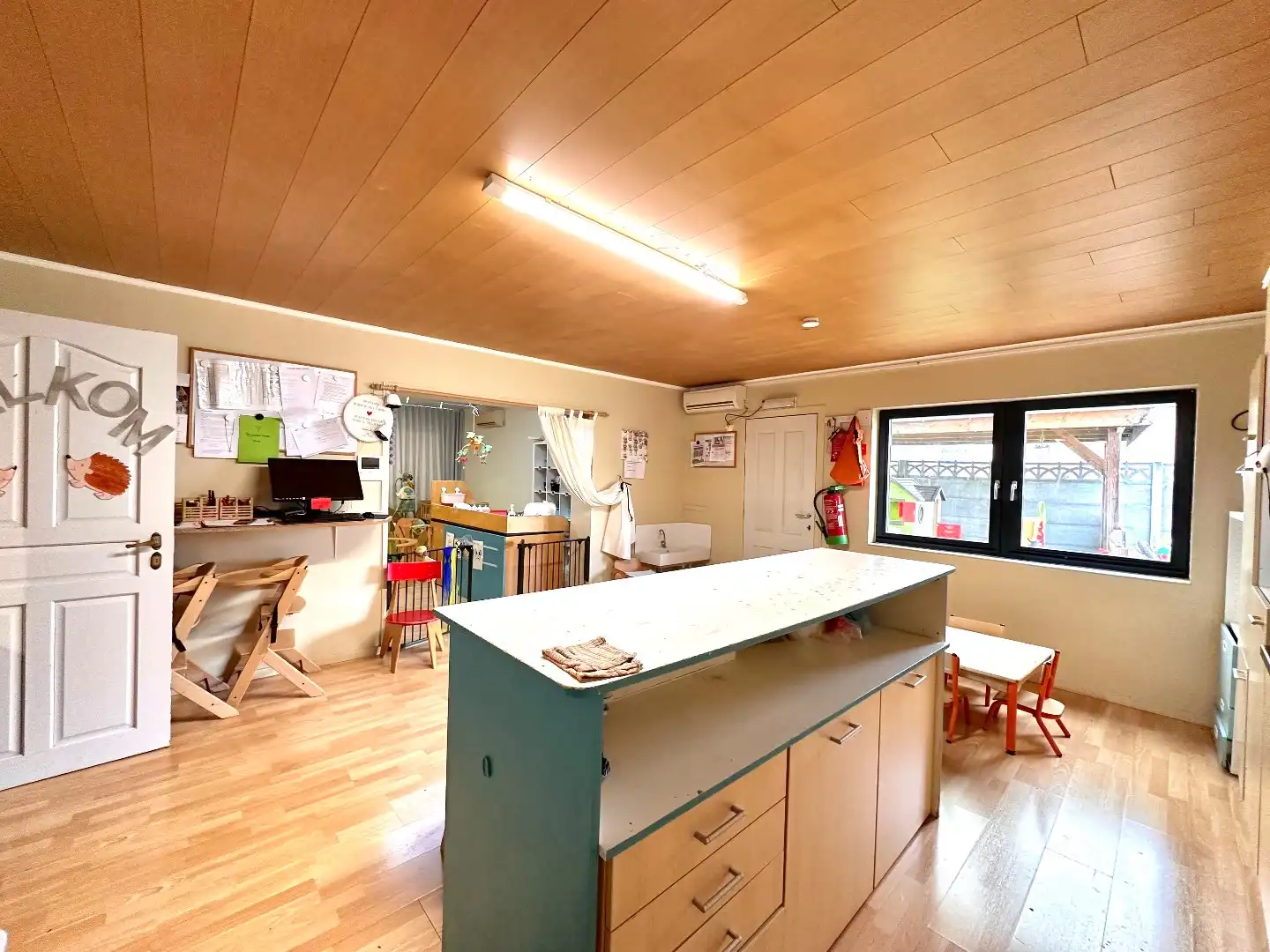 Veelzijdig handelshuis met ruime tuin – momenteel ingericht als crèche foto 7
