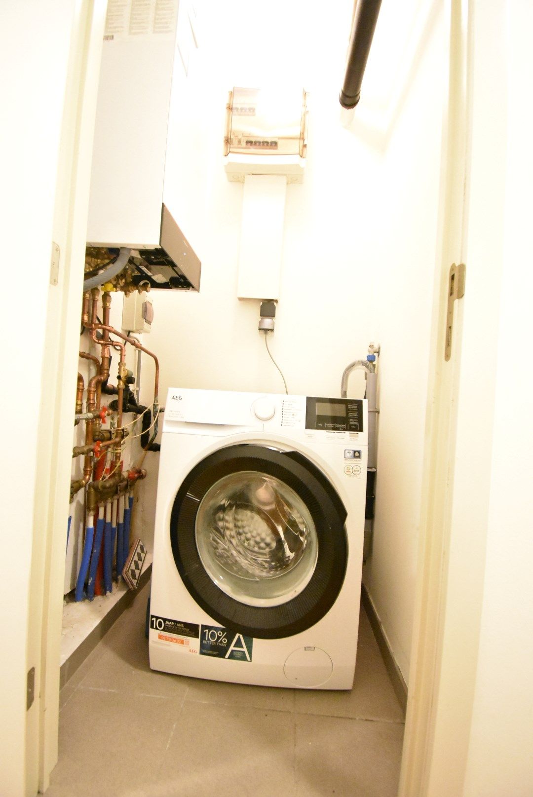 Degelijk 2-slaapkamer appartement met autostandplaats + in hartje Bilzen foto 24