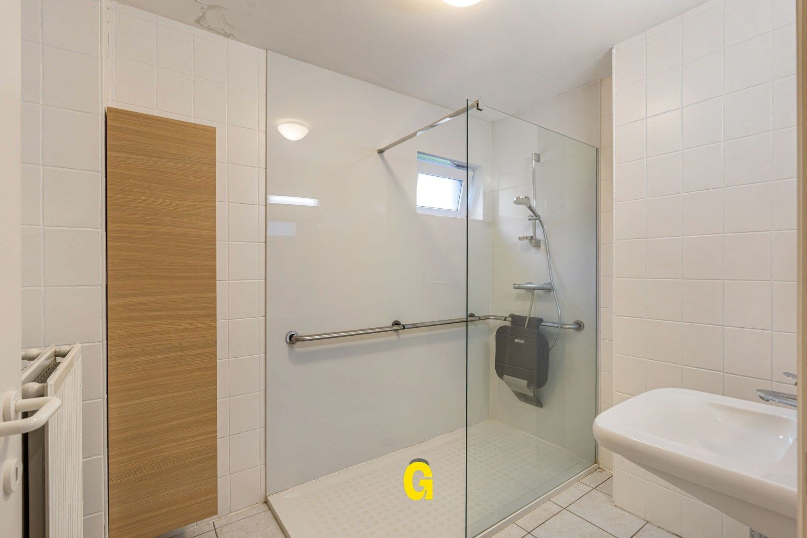 Degelijk (rolstoelvriendelijk) gelijkvoersappartement met terras uitgevend op de tuin, afsluitbare garage en berging foto 3