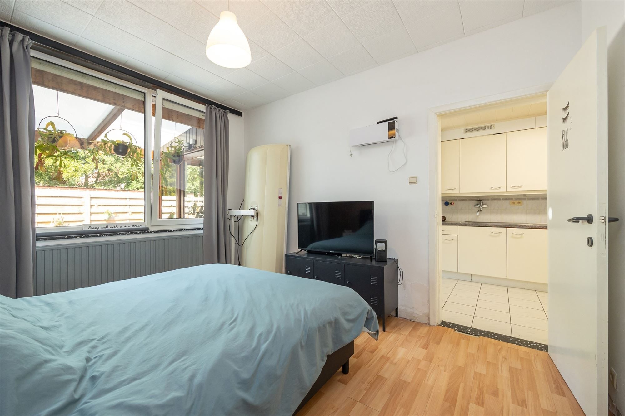 Gelijkvloersappartement met stadskoer en garagebox foto 14