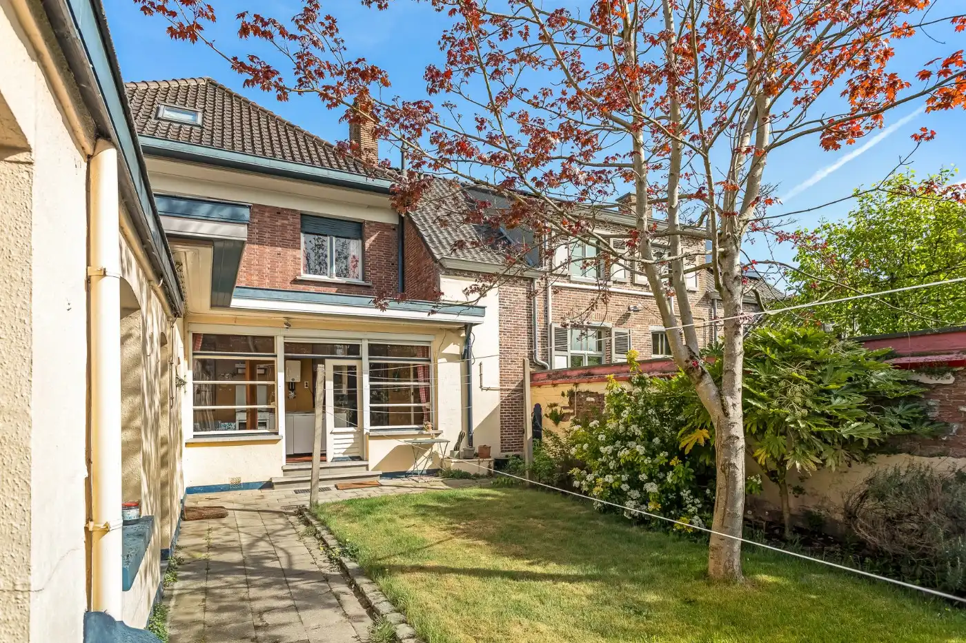 Te renoveren, geklasseerde art deco woning met 3 slpk, ruime zolder en Z-tuin foto 28