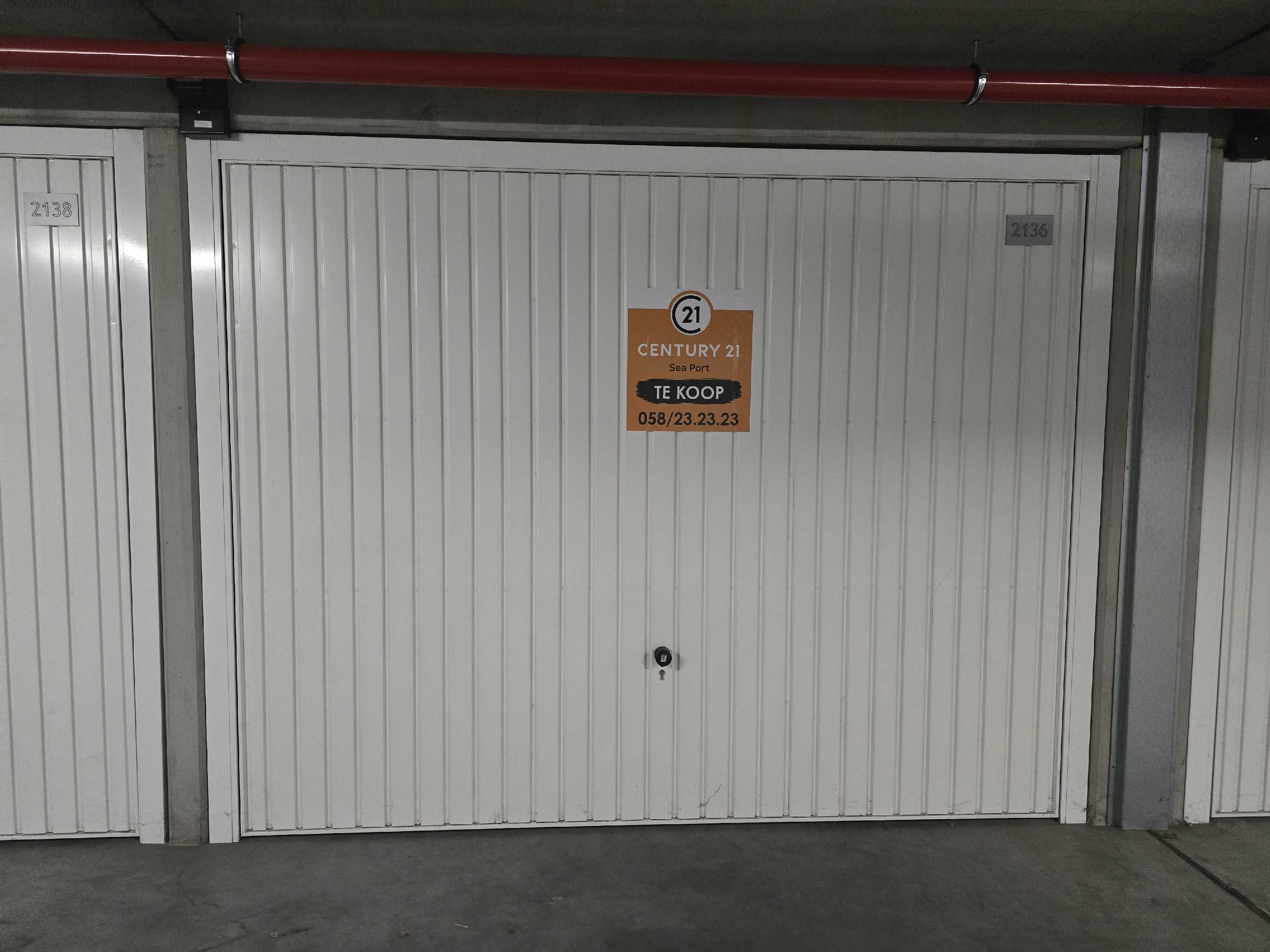 Enkele garagebox vlakbij de zee foto 2