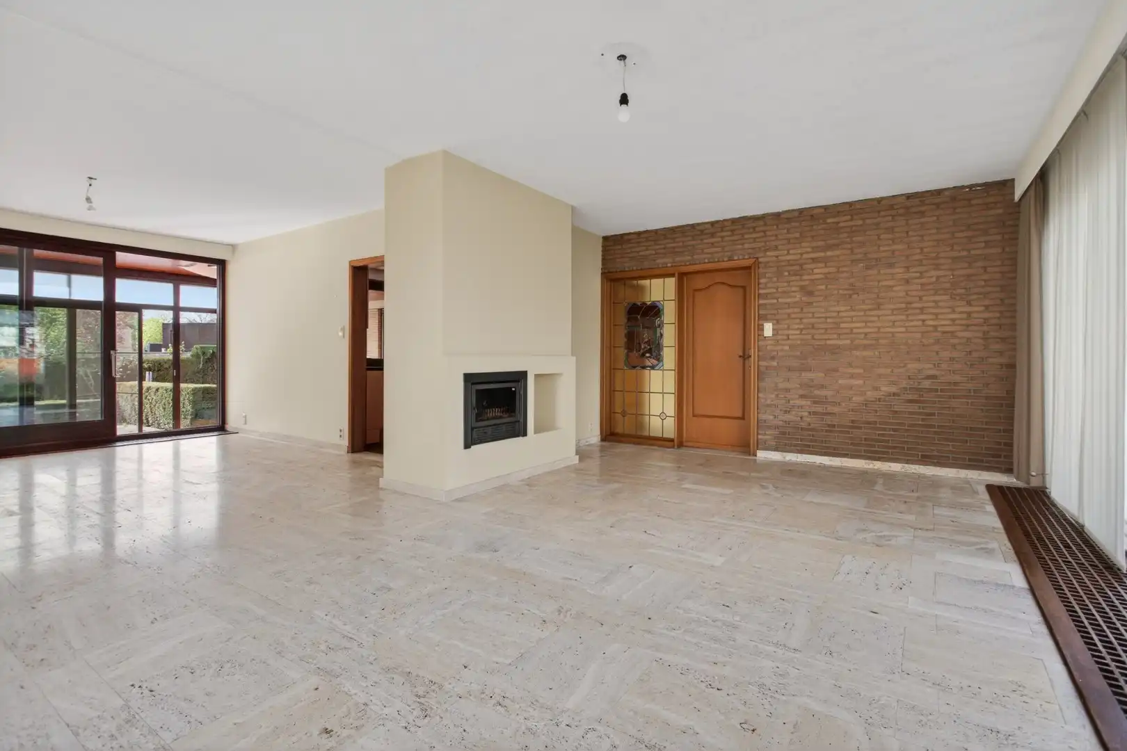 Ruime gelijkvloerse woning met veel potentieel op rustige ligging in Mol foto 15