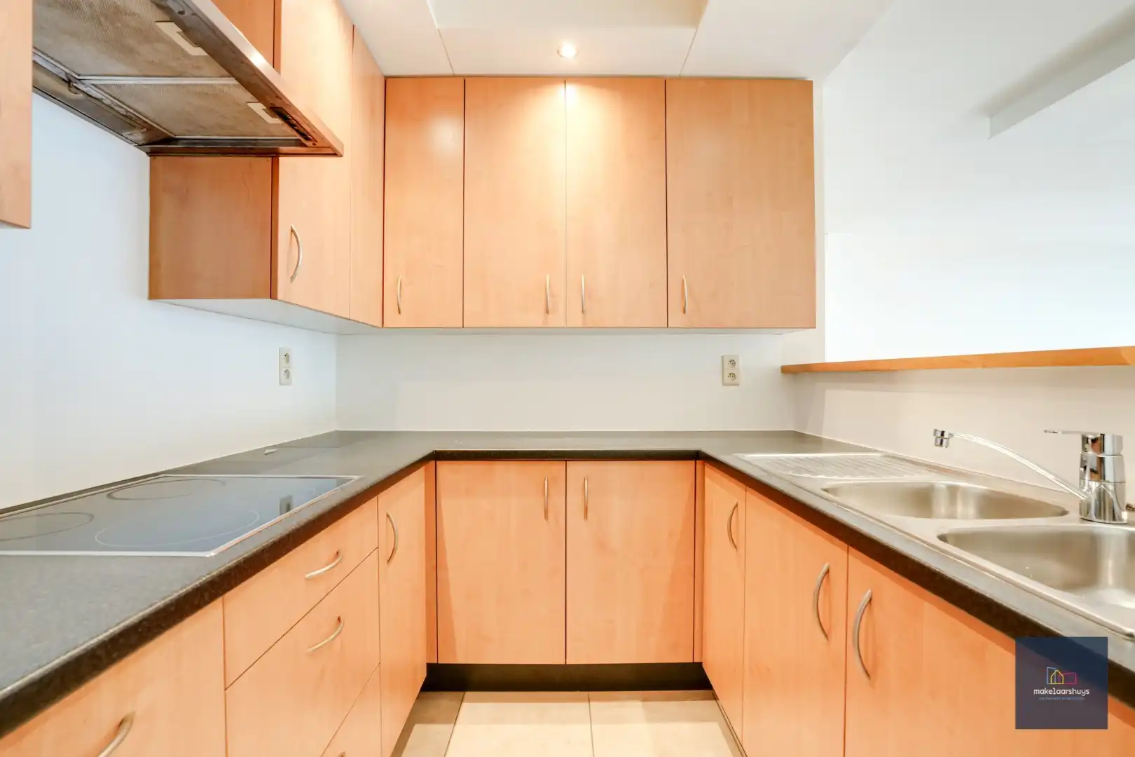 Goedgelegen 2slpk-appartement met terras en staanplaats foto 9