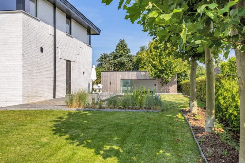 Zeer energiezuinig, gelijkvloers appartement met tuin, poolhouse en zwemvijver foto 28