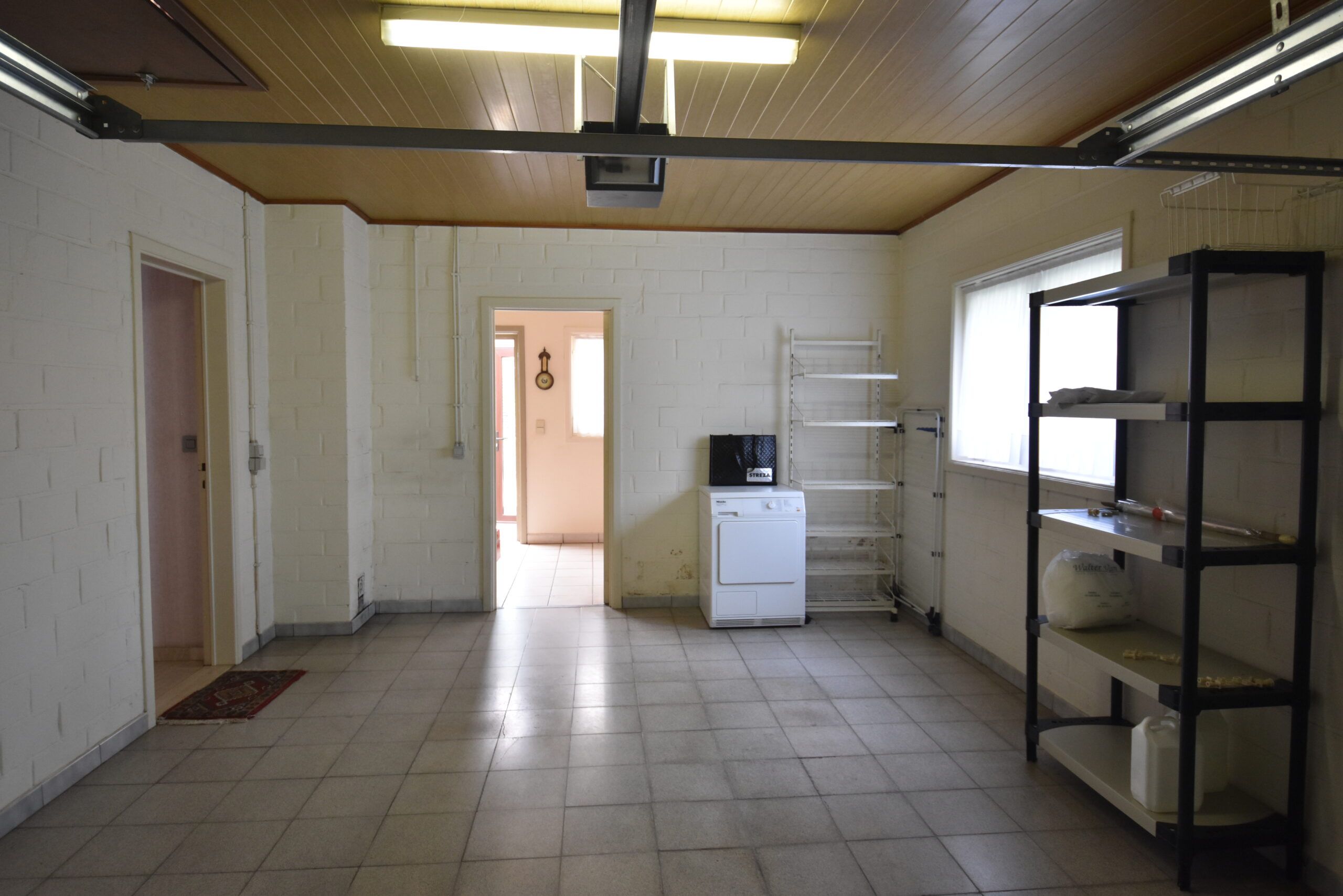 Ruim landhuis met prachtige tuin in rustige straat in Nieuwkerken foto 17