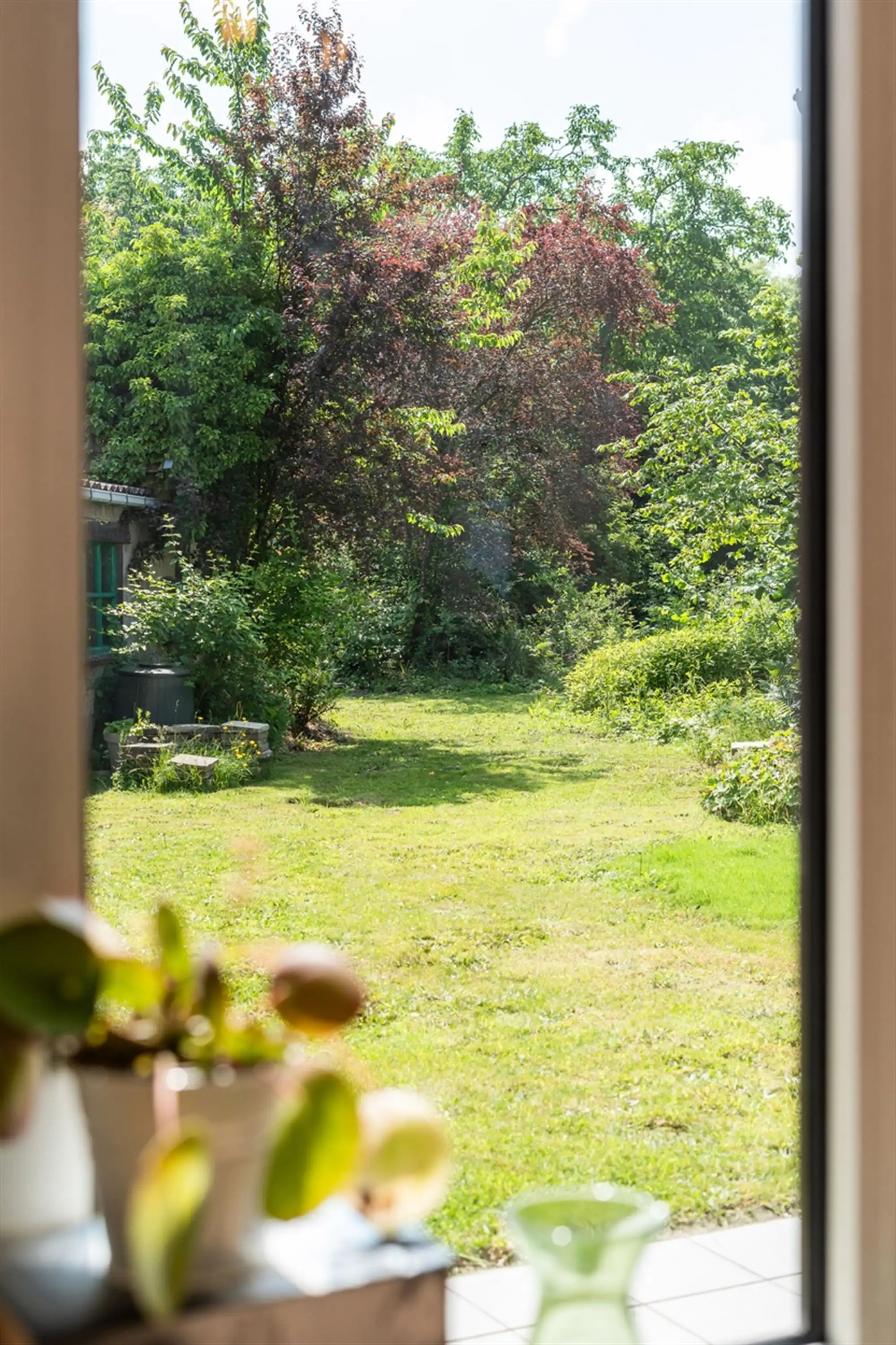 KARAKTERVOLLE WONING met 4 slaapkamers, garage & tuin op een perceel van ca. 811m² foto 9